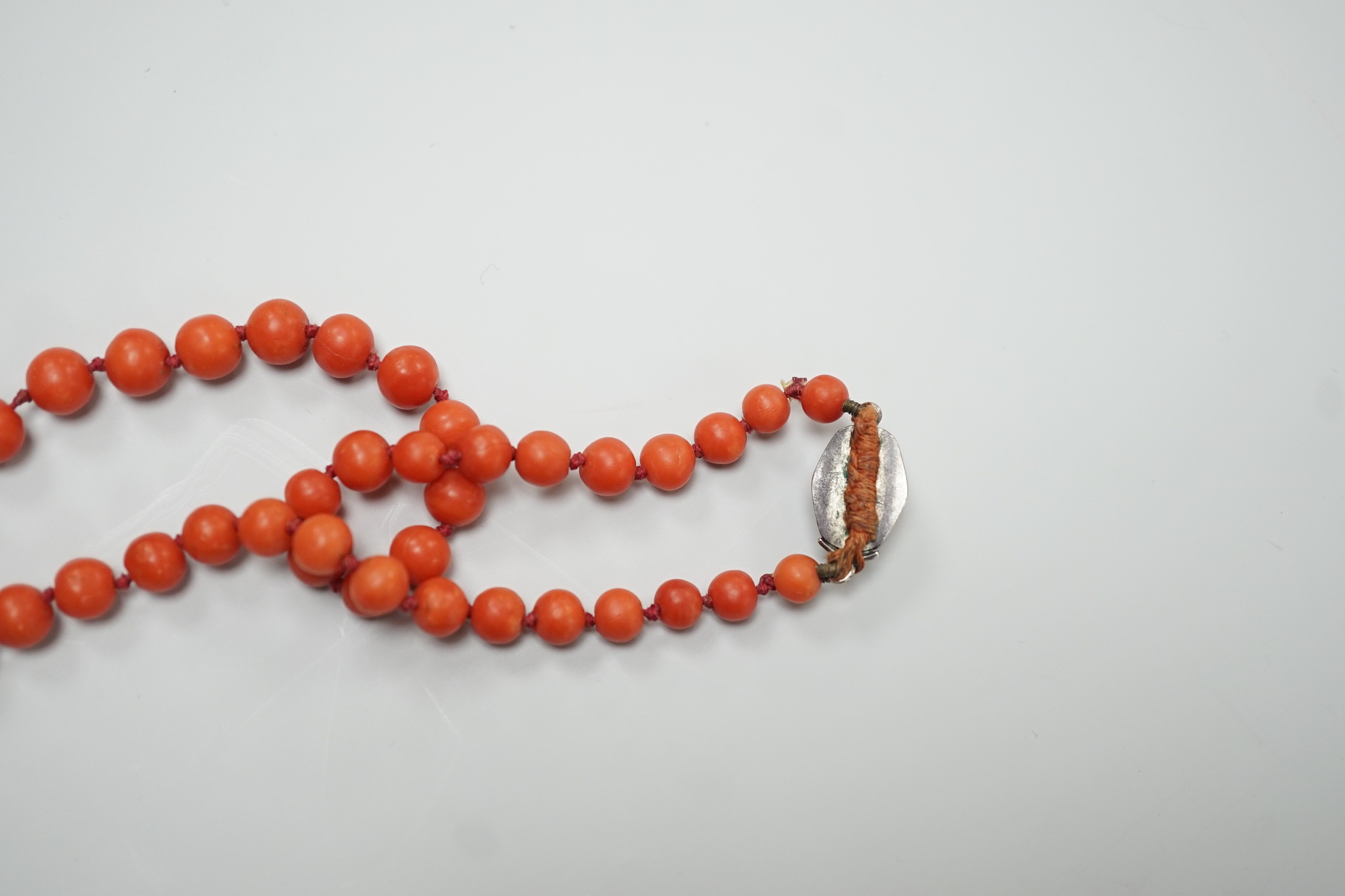 A single strand graduated coral bead necklace, 56cm, gross weight 42 grams.